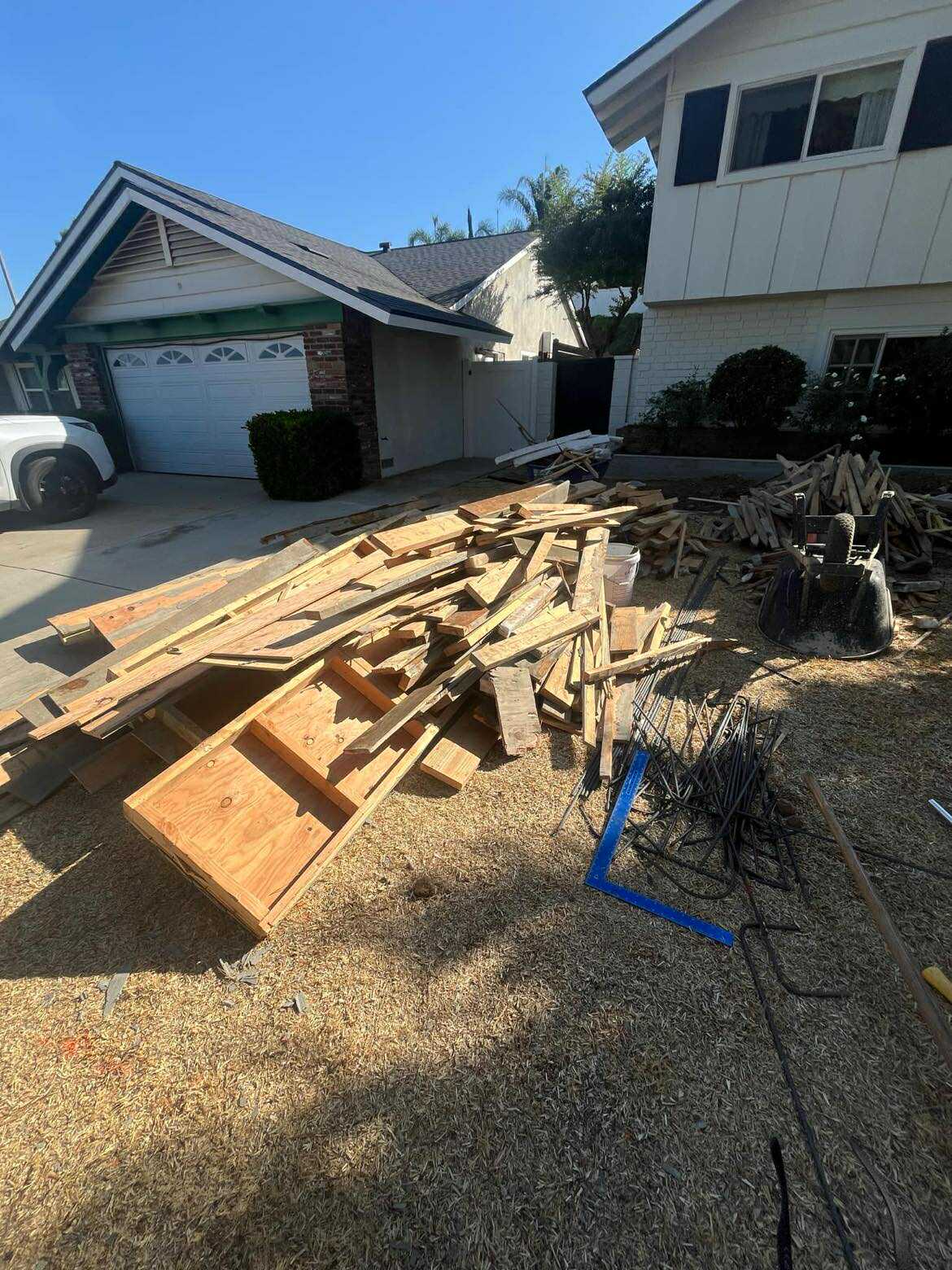 Wood and construction debris from deck demolition in Menifee CA