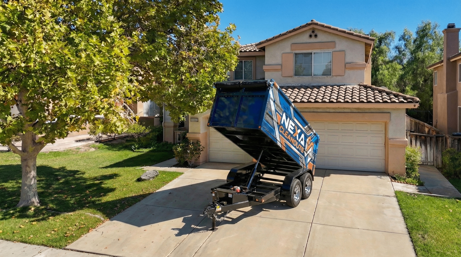 Nexa Cleanouts dump trailer positioned for residential junk removal in Murrieta CA