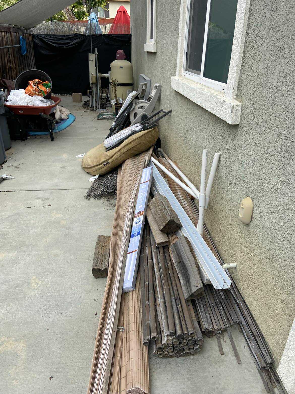 Swing set and playset removal in backyard in Menifee